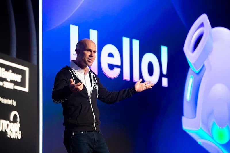 Man speaking at ai engineer worlds fair