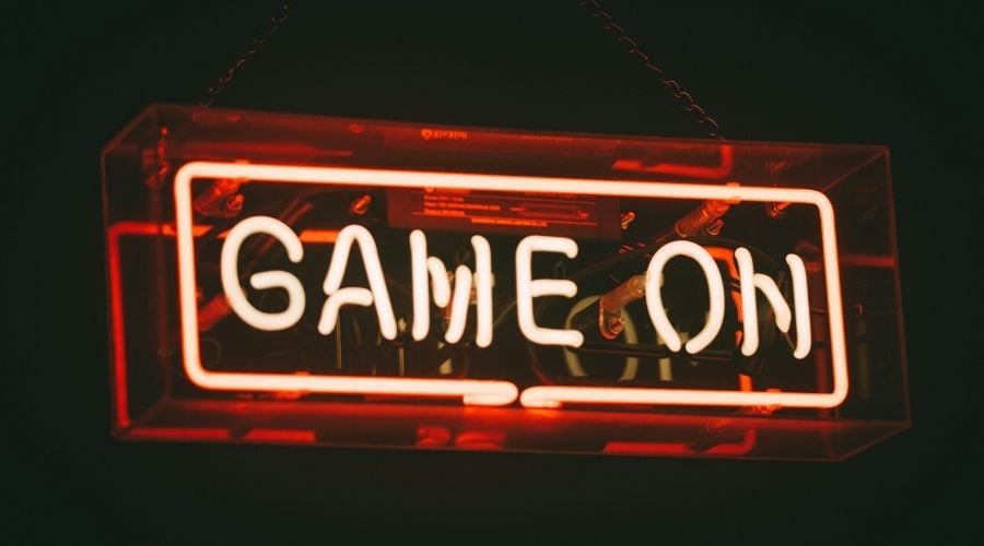 neon sign that says "game on"